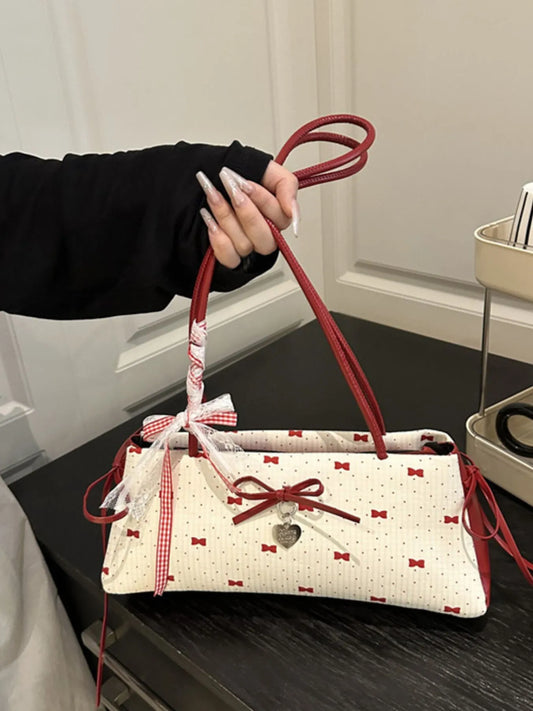 Small white Bow Print Shoulder Bag with red handles and decorative bows in PU leather and polyester